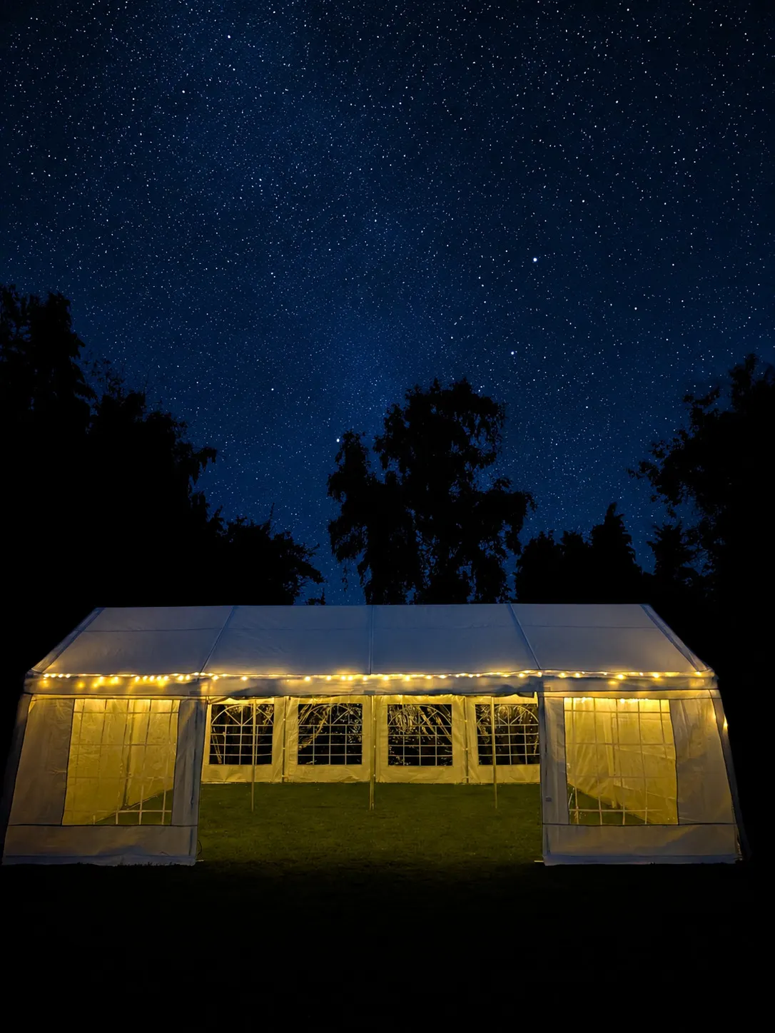 The Estate 8x4 lit for an evening garden party